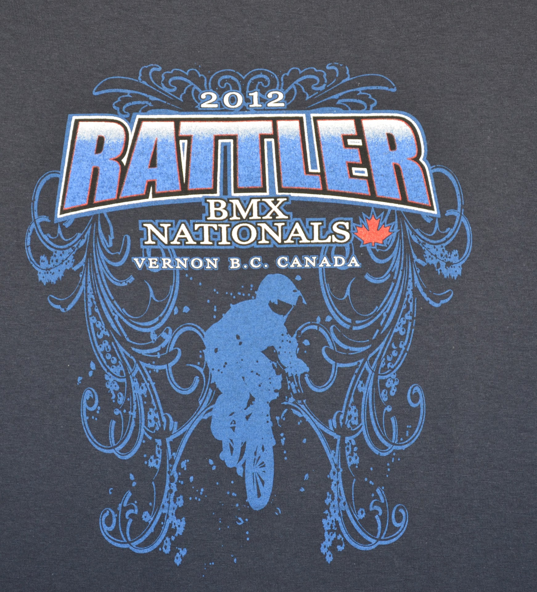2012 Rattler BMX Nationals t-shirt featuring a bold graphic and event details, showcasing BMX racing culture.