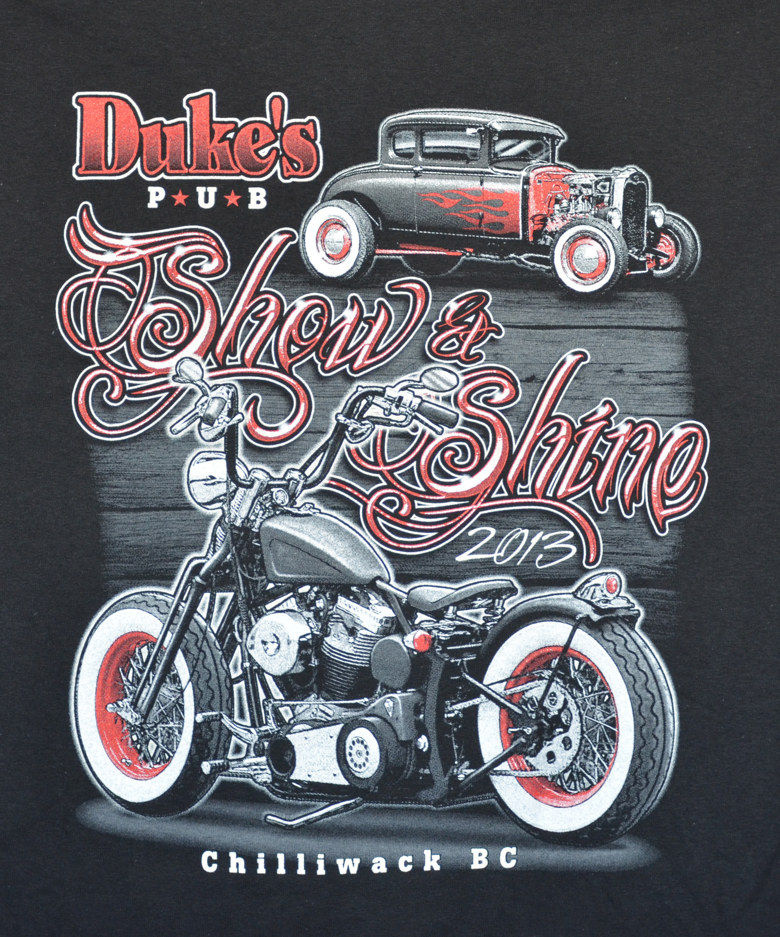 Duke's Show and Shine t-shirt featuring a vibrant design with car graphics and event details.