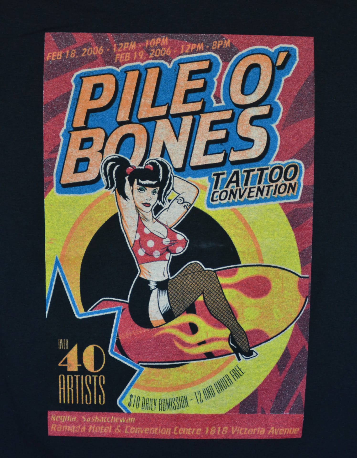 A t-shirt featuring a woman surfing on a surfboard, titled "Pile O Bones Shirt."