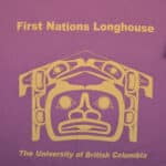 First Nations Longhouse shirt featuring traditional patterns and colors, symbolizing cultural heritage and community.