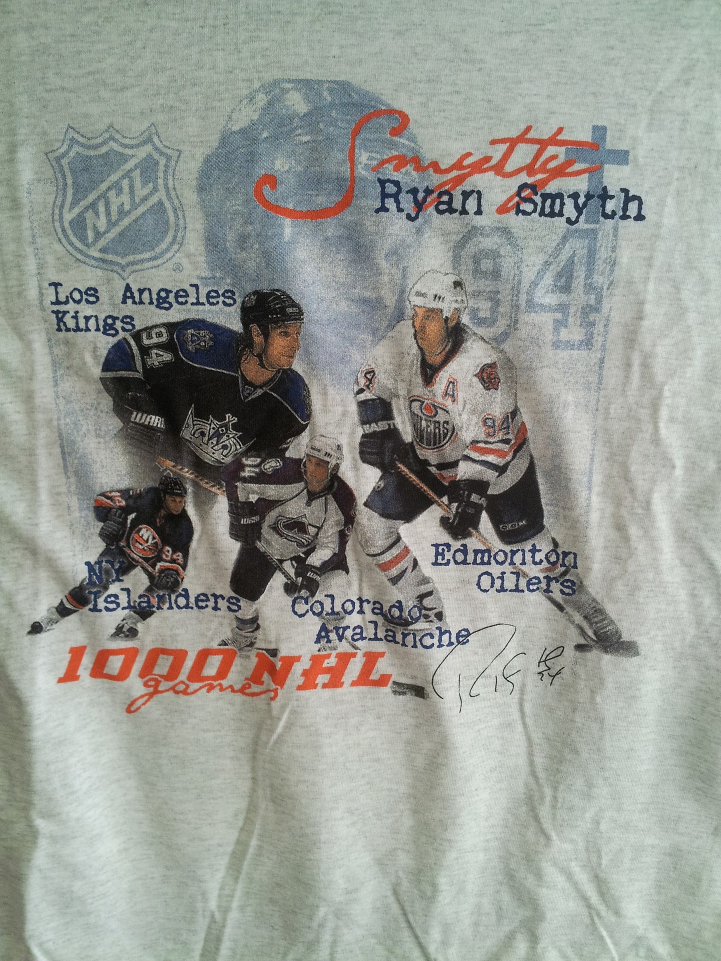 T-shirt featuring an image of Ryan Smith alongside the NHL logo, showcasing team spirit and fan support.